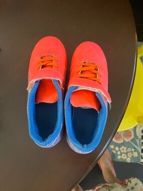 Kids fluorescent orange and Blue soccer cleats - boys size 2